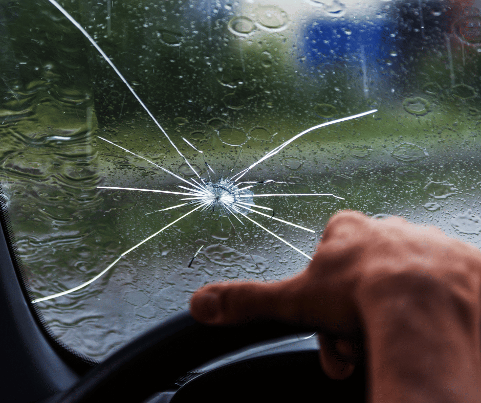 Image of cracked windshield when raining